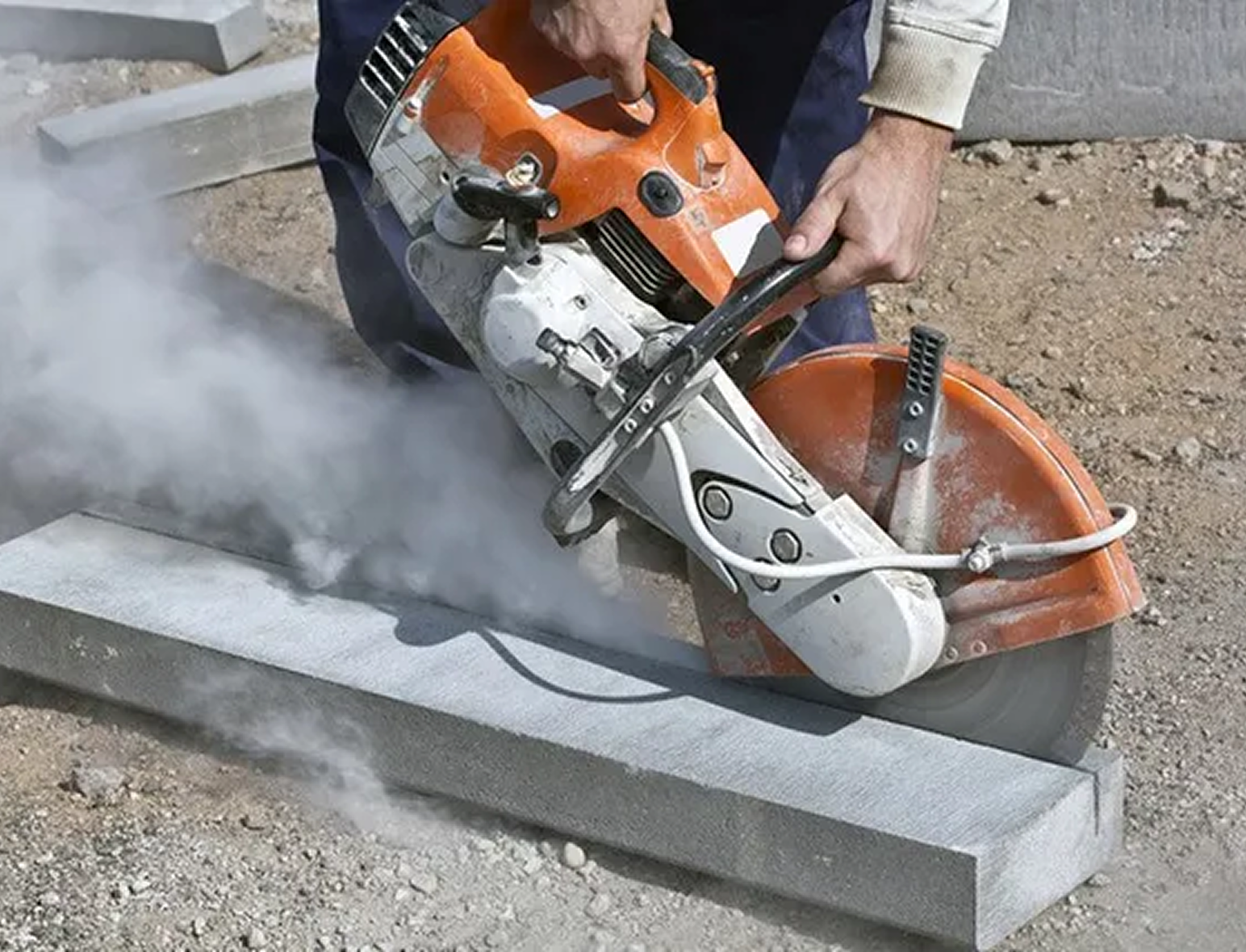 Hand saw cutting concrete wall